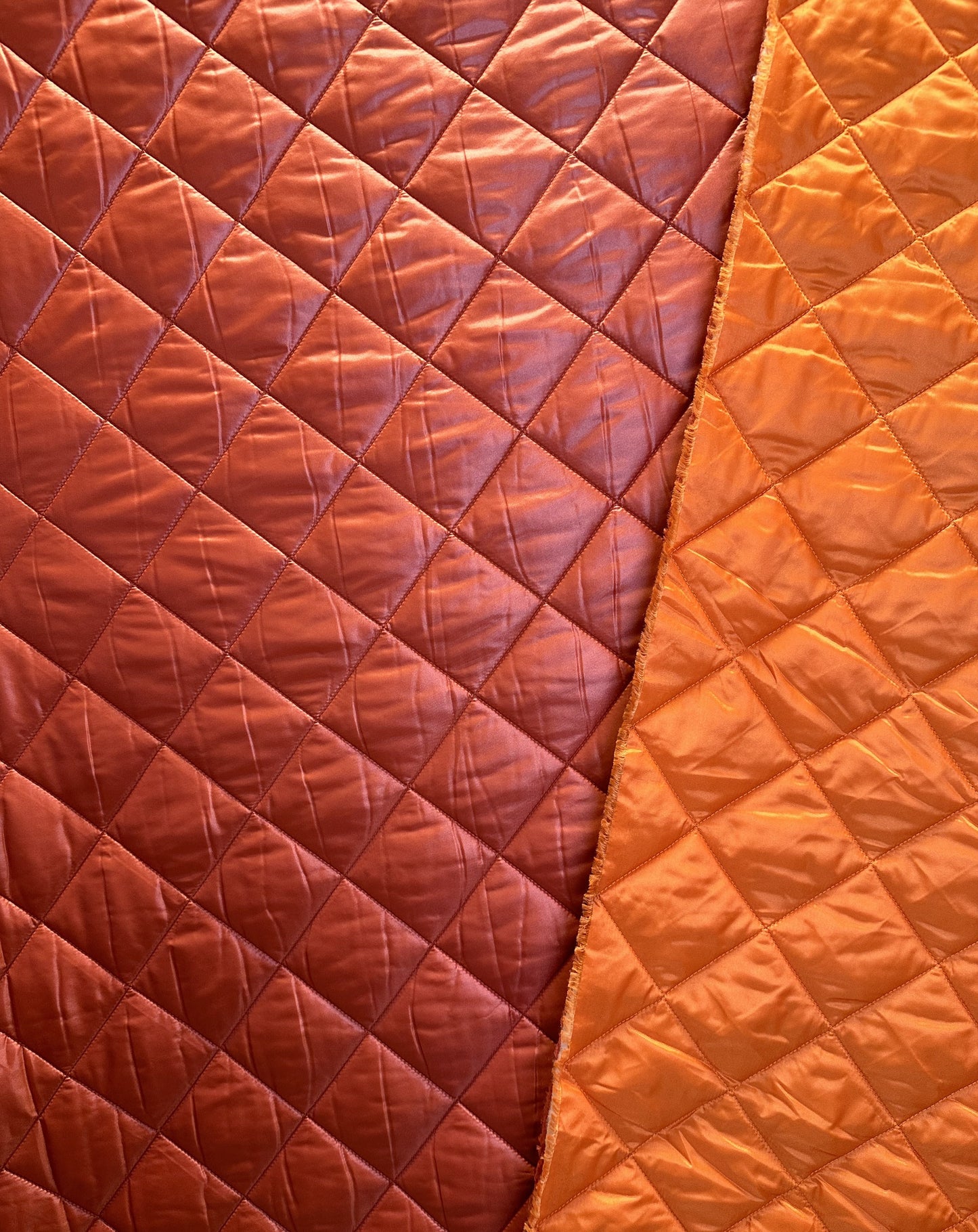 Tikattu toppakangas, poltettu oranssi