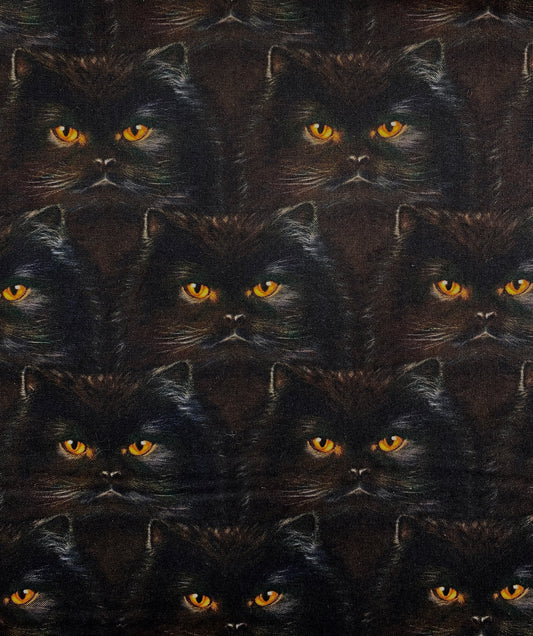 Mustat kissat, puuvilla