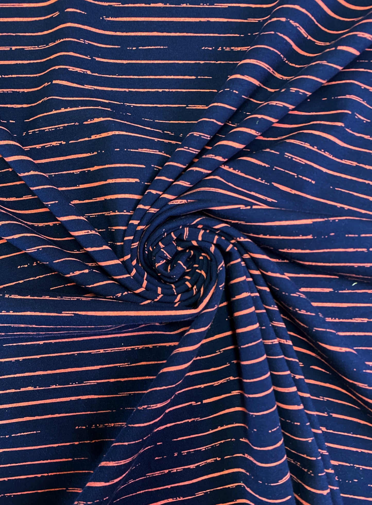 Horisontti, tummansin. vaal. pun. puuvillatrikoo