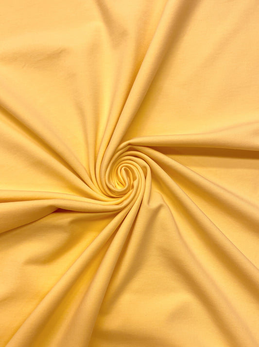 Vaaleankeltainen, puuvillatrikoo