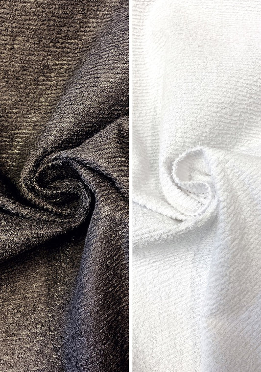 Muovitettu frotee, musta ja valkoinen