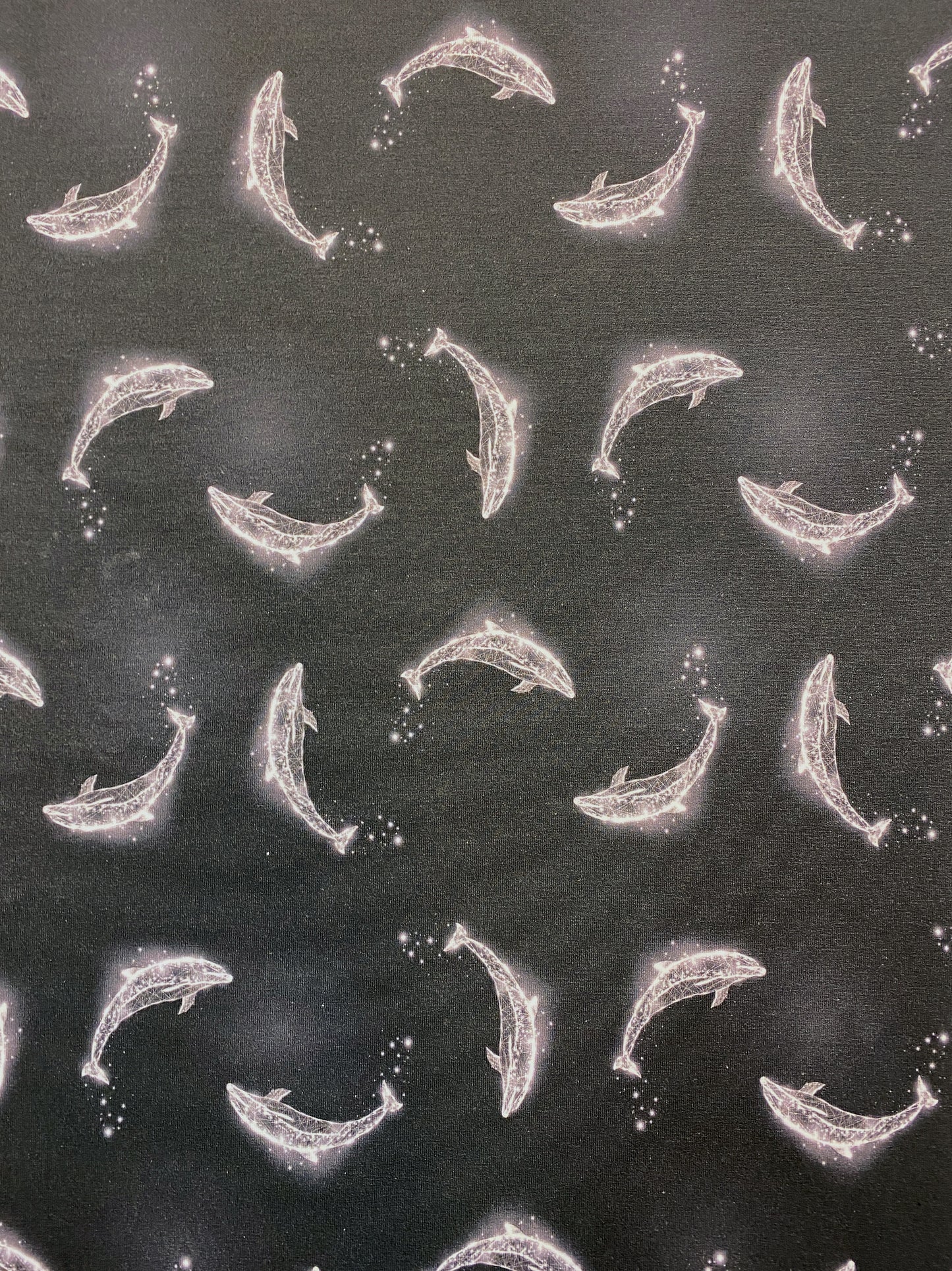 Hohtodelfiinit, puuvillatrikoo