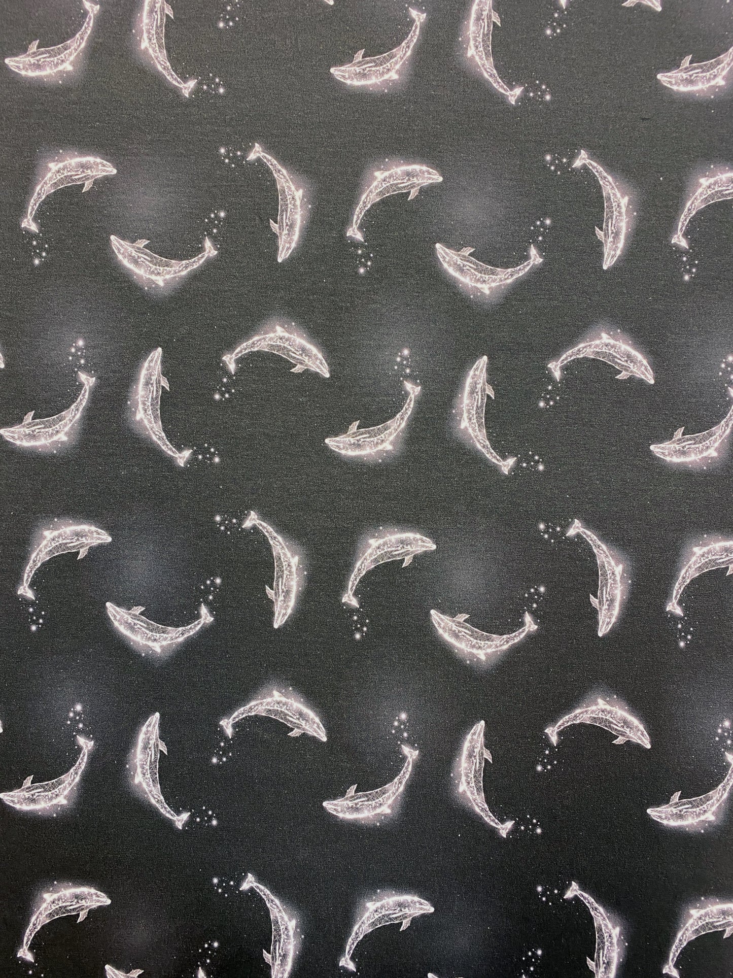 Hohtodelfiinit, puuvillatrikoo