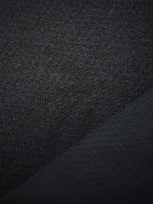 Givenchy, tummansininen merinovillaneulos.