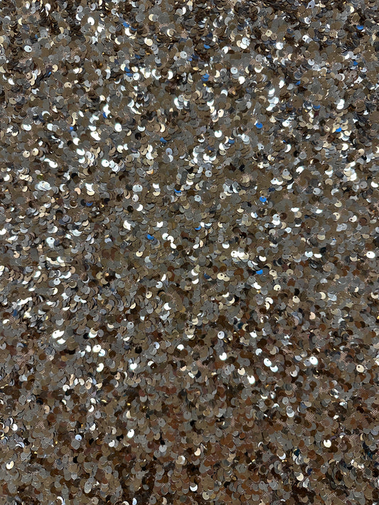 Joustava paljettikangas.